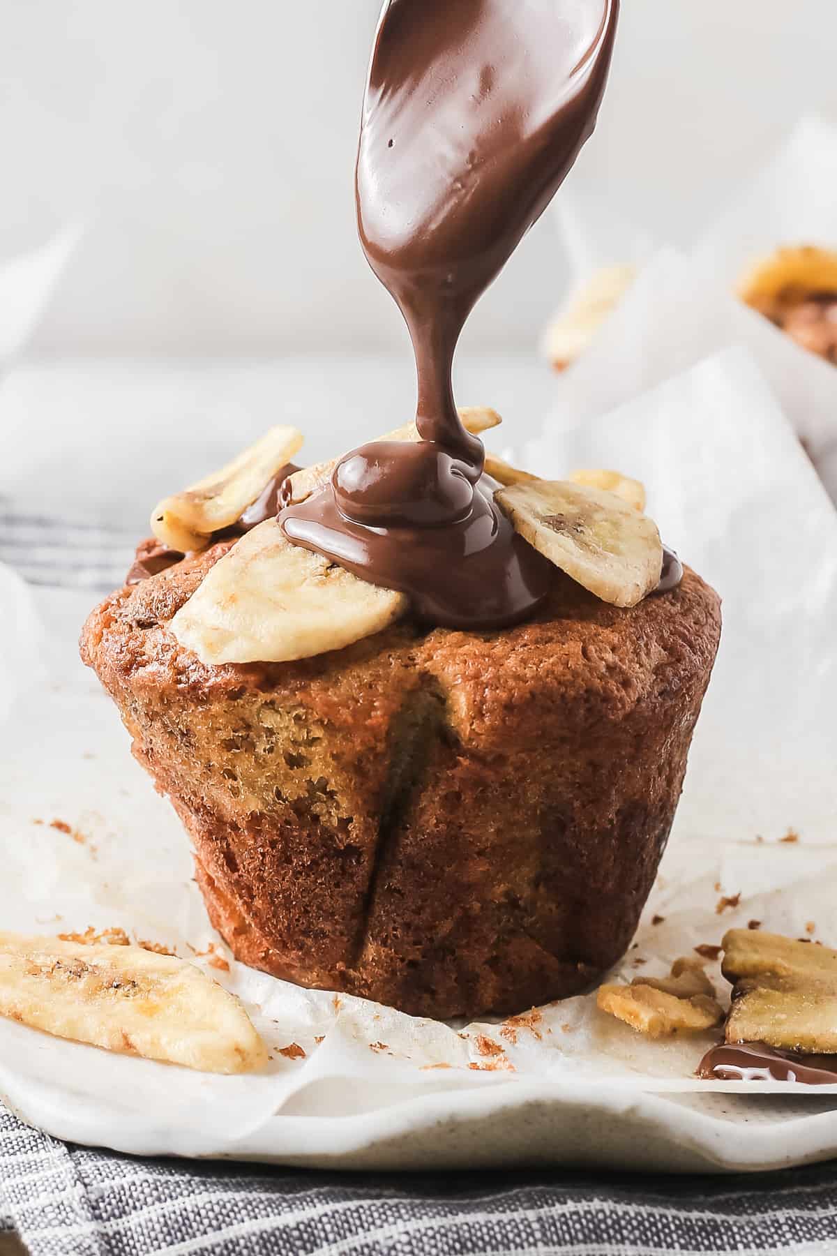 Banana Chocolate Muffins on a scalloped plate